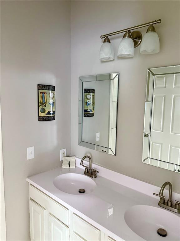 9201 N Harrison St, Kansas City, MO 64155 - bathroom with double vanity