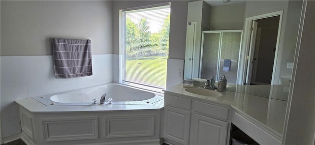 9201 N Harrison St, Kansas City, MO 64155 - full bathroom featuring a stall shower, a bath, and vanity
