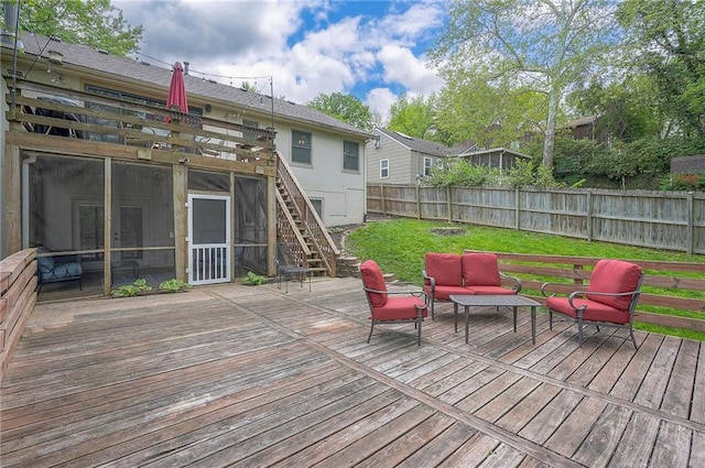 wooden terrace featuring a sunroom, outdoor lounge area, and stairway