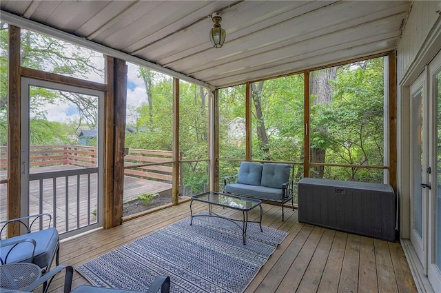 sunroom / solarium with outdoor lounge area