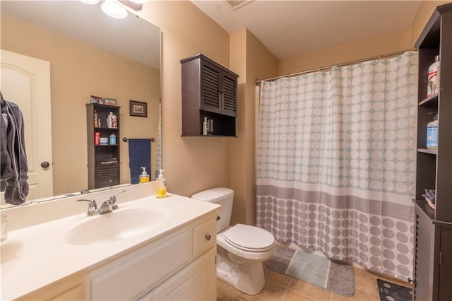 full bath with vanity, tile patterned floors, toilet, and a shower with curtain