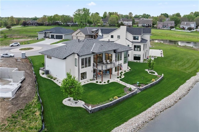 aerial perspective of suburban area with a large body of water