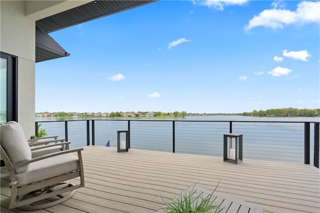 dock with a balcony and a water view