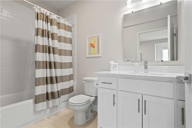 full bathroom featuring toilet, vanity, and shower / bath combo