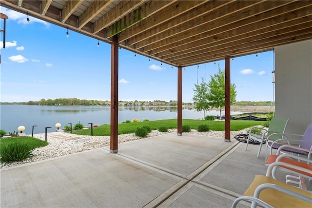 view of patio / terrace with a water view