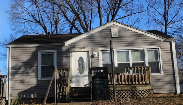 view of front of house with a wooden deck