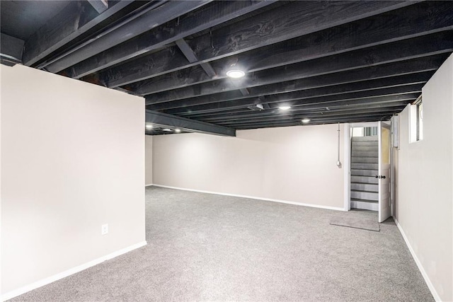 9505 E 79th St, Raytown, MO 64138 - basement with stairway, carpet, and baseboards