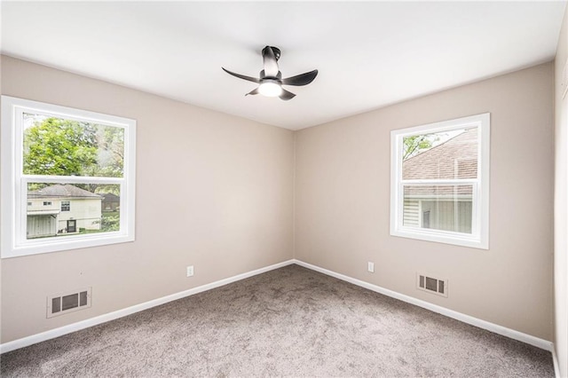 9505 E 79th St, Raytown, MO 64138 - unfurnished room featuring visible vents, carpet floors, and a healthy amount of sunlight