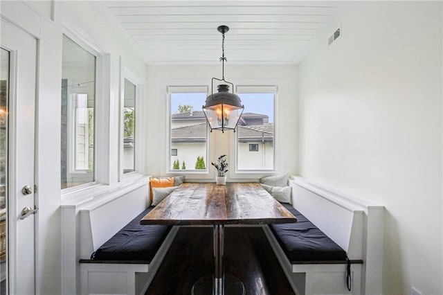 dining area with visible vents and breakfast area