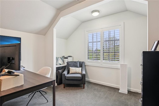 office with carpet flooring, vaulted ceiling, and baseboards