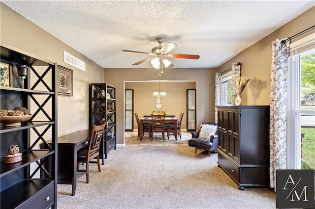 1708 NW Ashton Dr, Blue Springs, MO 64015 - sitting room featuring ceiling fan, a textured ceiling, carpet, baseboards, and visible vents