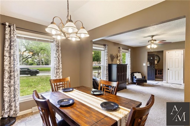 1708 NW Ashton Dr, Blue Springs, MO 64015 - dining space with baseboards and ceiling fan with notable chandelier