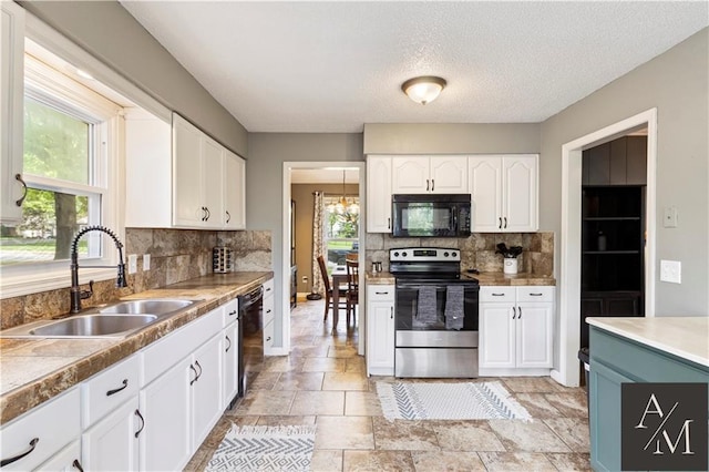 1708 NW Ashton Dr, Blue Springs, MO 64015 - kitchen with a sink, decorative backsplash, black appliances, and white cabinetry