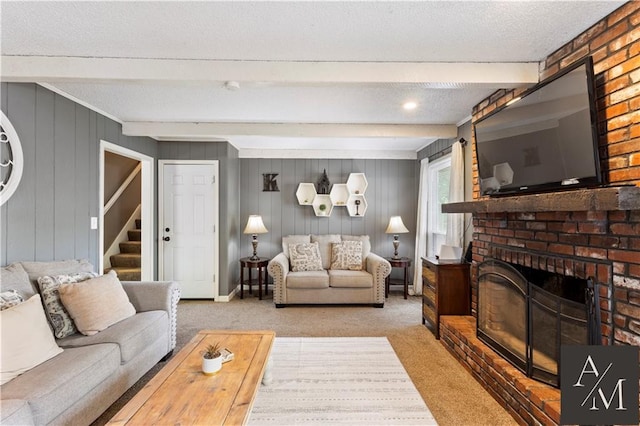 1708 NW Ashton Dr, Blue Springs, MO 64015 - carpeted living area with a textured ceiling, a fireplace, stairs, and beam ceiling