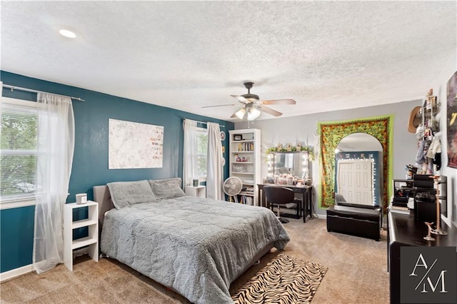 1708 NW Ashton Dr, Blue Springs, MO 64015 - bedroom with ceiling fan, carpet floors, baseboards, and a textured ceiling
