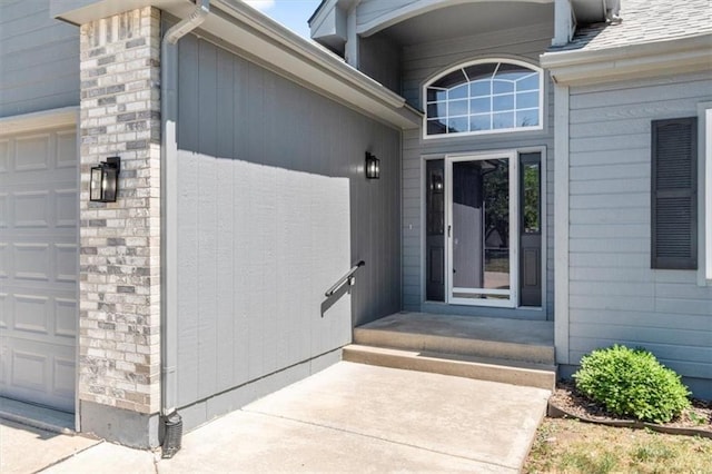 709 SW Graystone Dr, Grain Valley, MO 64029 - property entrance with a garage
