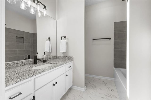 709 SW Graystone Dr, Grain Valley, MO 64029 - bathroom with vanity, marble finish flooring, and shower / tub combination