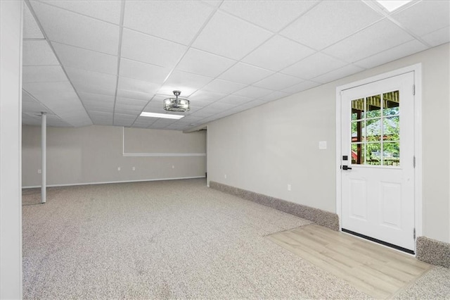 709 SW Graystone Dr, Grain Valley, MO 64029 - basement with a paneled ceiling and carpet