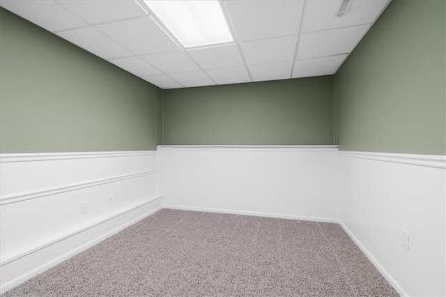 709 SW Graystone Dr, Grain Valley, MO 64029 - carpeted spare room with a paneled ceiling and wainscoting