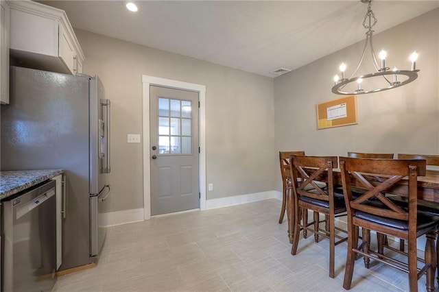dining area with baseboards, recessed lighting, a chandelier, and visible vents