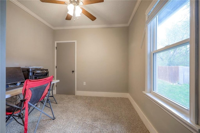 office area with carpet floors, ceiling fan, ornamental molding, and baseboards