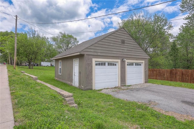 detached garage with fence