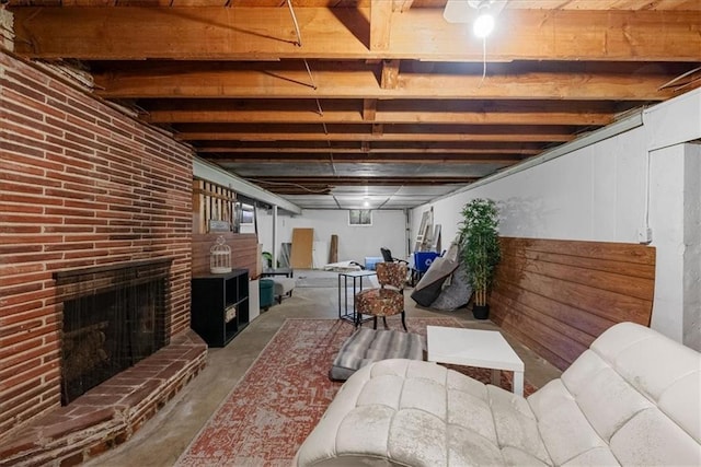 below grade area with a fireplace