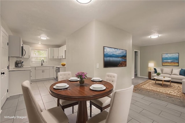 dining room with baseboards