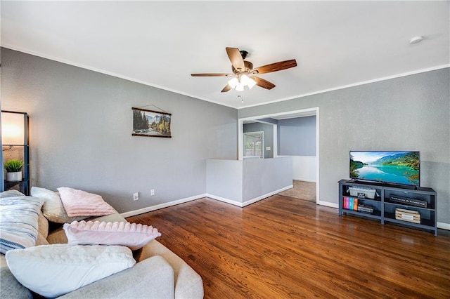 501 N Westwood Dr, Independence, MO 64050 - living room featuring ceiling fan, wood finished floors, baseboards, ornamental molding, and a textured wall