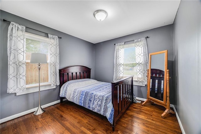 501 N Westwood Dr, Independence, MO 64050 - bedroom with baseboards and wood finished floors