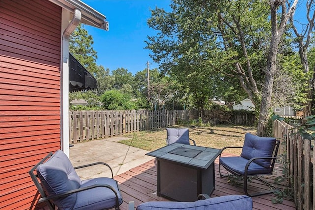 deck featuring a fenced backyard