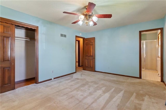 3311 S Crane St, Independence, MO 64055 - unfurnished bedroom featuring light carpet, baseboards, a closet, and a ceiling fan