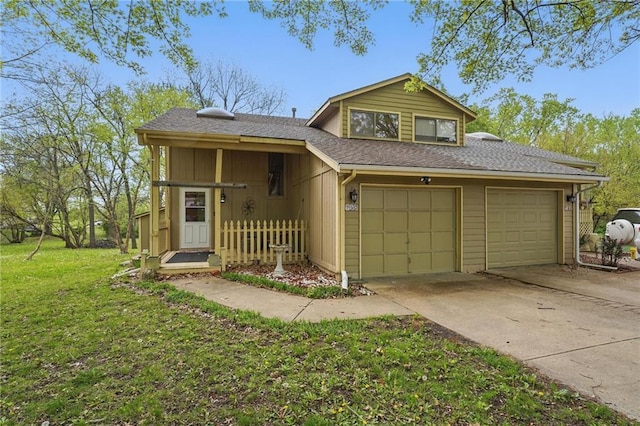 view of front of property with driveway, roof with shingles, and a front yard