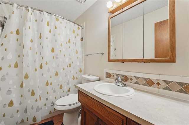 bathroom featuring toilet, tasteful backsplash, vanity, tile patterned floors, and a shower with shower curtain