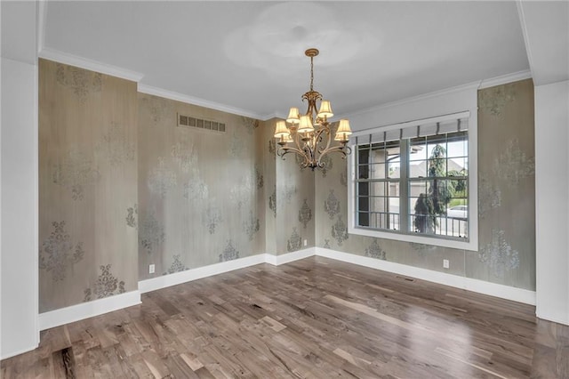 25203 W 97th Ter, Lenexa, KS 66227 - unfurnished dining area featuring wood finished floors, a chandelier, wallpapered walls, baseboards, and crown molding