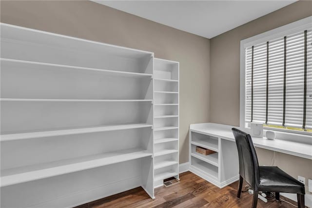 25203 W 97th Ter, Lenexa, KS 66227 - unfurnished office featuring dark wood-style flooring