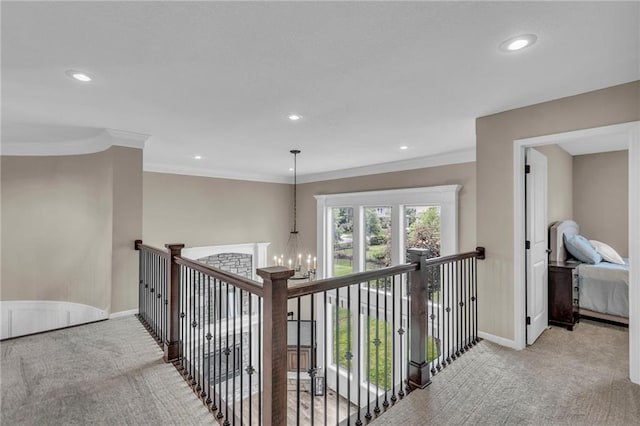 25203 W 97th Ter, Lenexa, KS 66227 - corridor featuring carpet floors, baseboards, recessed lighting, a chandelier, and ornamental molding