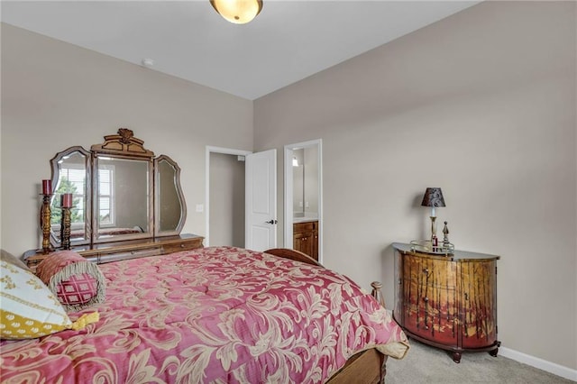 25203 W 97th Ter, Lenexa, KS 66227 - carpeted bedroom featuring ensuite bath and baseboards