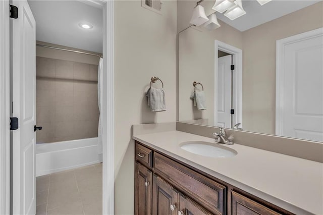 25203 W 97th Ter, Lenexa, KS 66227 - full bathroom with tile patterned flooring, vanity, shower / bath combo, and recessed lighting