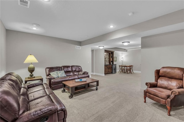 25203 W 97th Ter, Lenexa, KS 66227 - living area featuring light carpet, baseboards, and recessed lighting