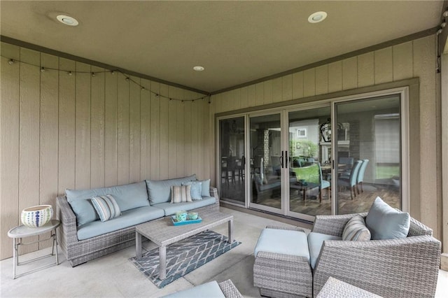 25203 W 97th Ter, Lenexa, KS 66227 - view of patio featuring an outdoor living space