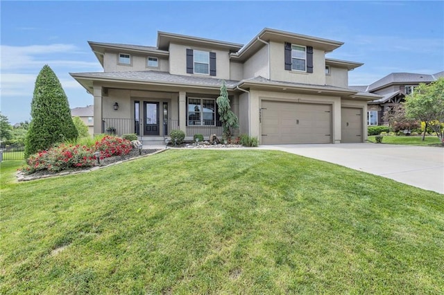 25203 W 97th Ter, Lenexa, KS 66227 - prairie-style house with stucco siding, a garage, driveway, covered porch, and a front yard