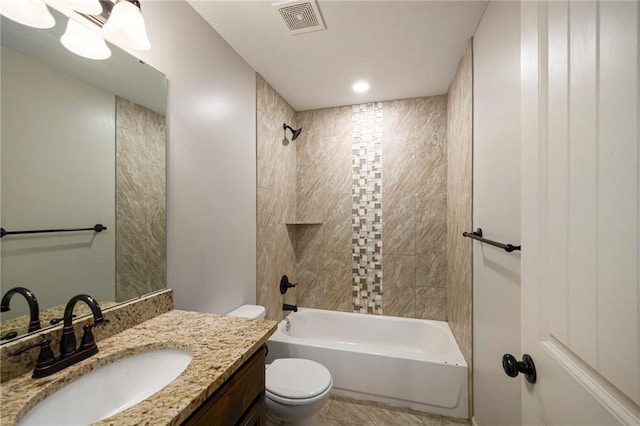 full bath featuring toilet, shower / bath combination, visible vents, and vanity