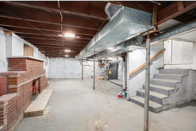 2922 Bales Ave, Kansas City, MO 64128 - unfinished basement with stairs
