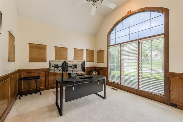 office with wainscoting, light colored carpet, ceiling fan, and lofted ceiling