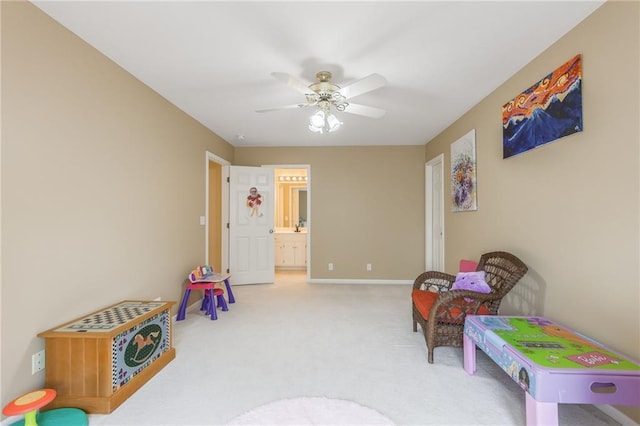 game room featuring a ceiling fan, carpet, and baseboards
