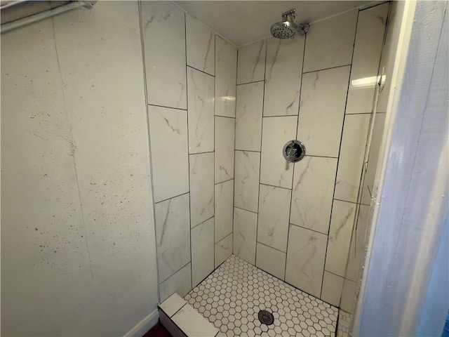 bathroom with a shower stall