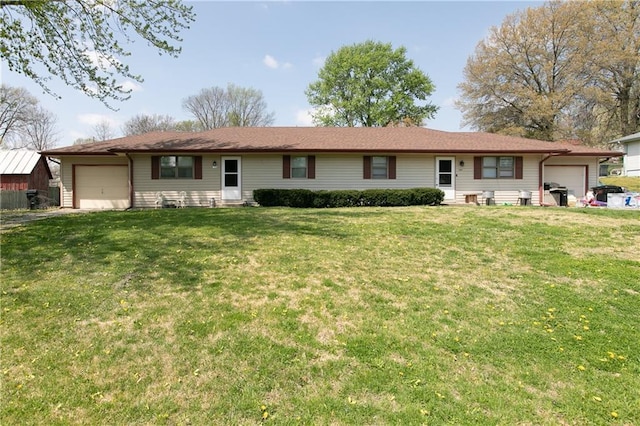 ranch-style home featuring a garage, a front lawn, and driveway