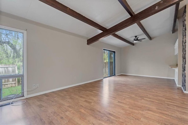 unfurnished living room featuring baseboards, beamed ceiling, ceiling fan, and light wood-style flooring