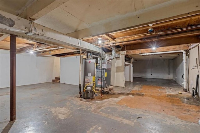 unfinished basement with gas water heater